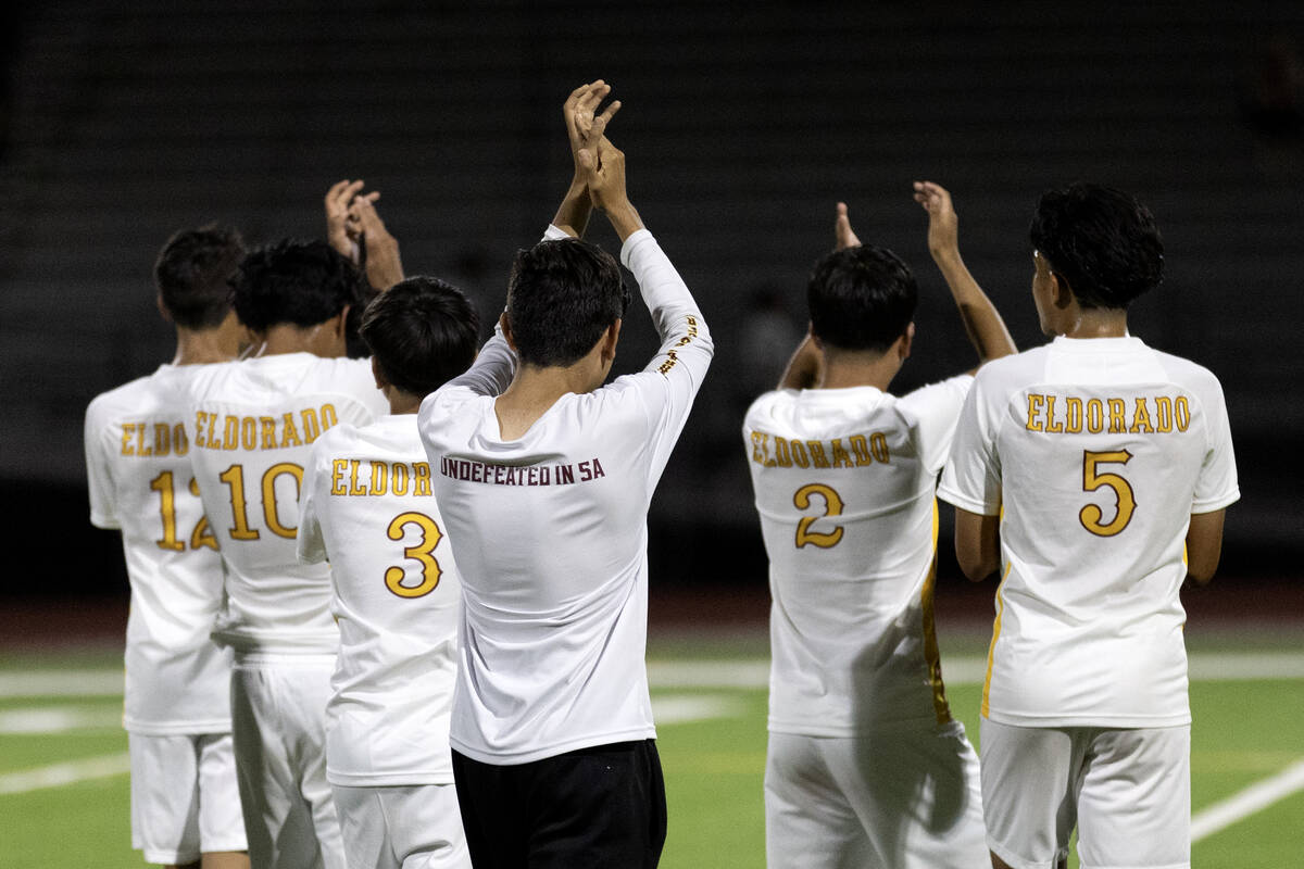 Eldorado claps toward their fan section after winning a boys high school soccer game against Ar ...