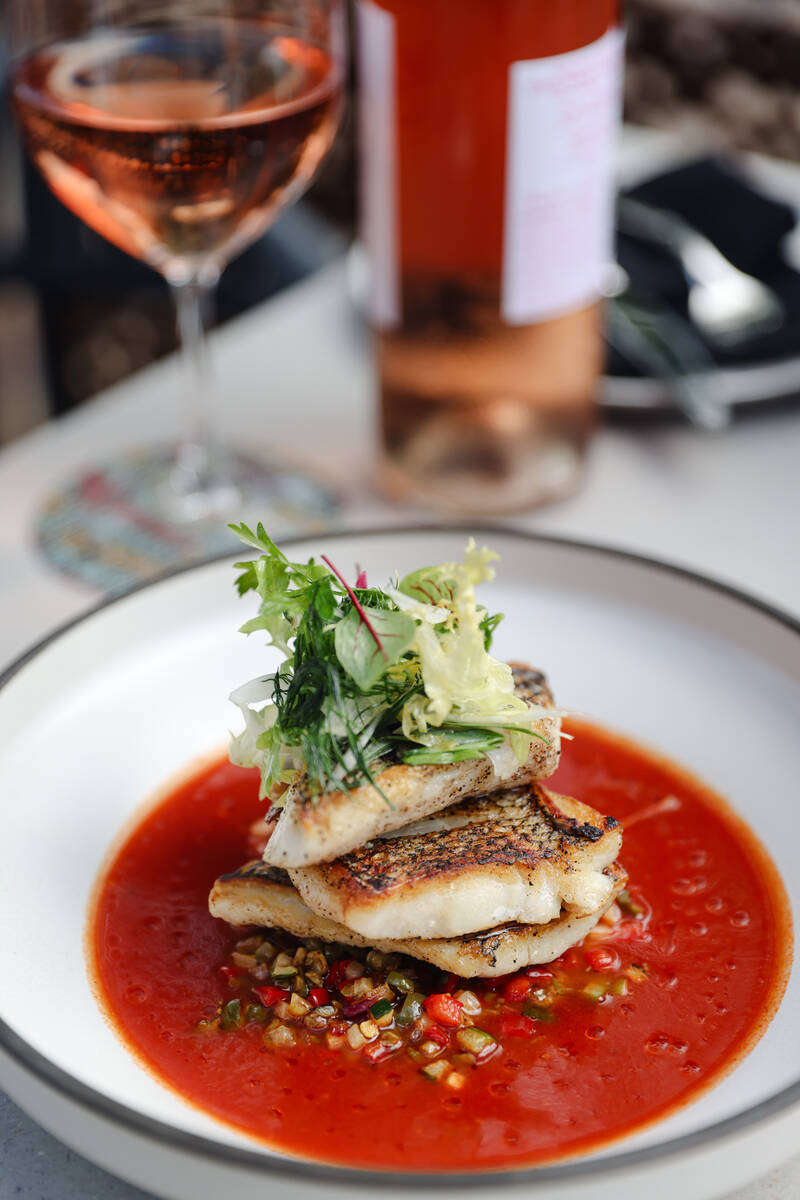 Seared Black Bass, with ratatouille vegetables and spiced citrus tomato broth, at Fine Company ...