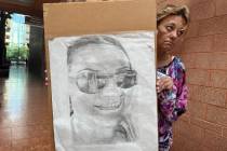 Lois Chase holds a picture of her daughter, Jamie Chase, at the Regional Justice Center on Tues ...