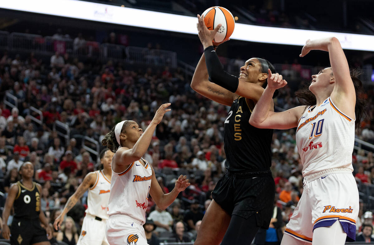 Las Vegas Aces forward A'ja Wilson (22) shoots against Phoenix Mercury forward Brianna Turner ( ...