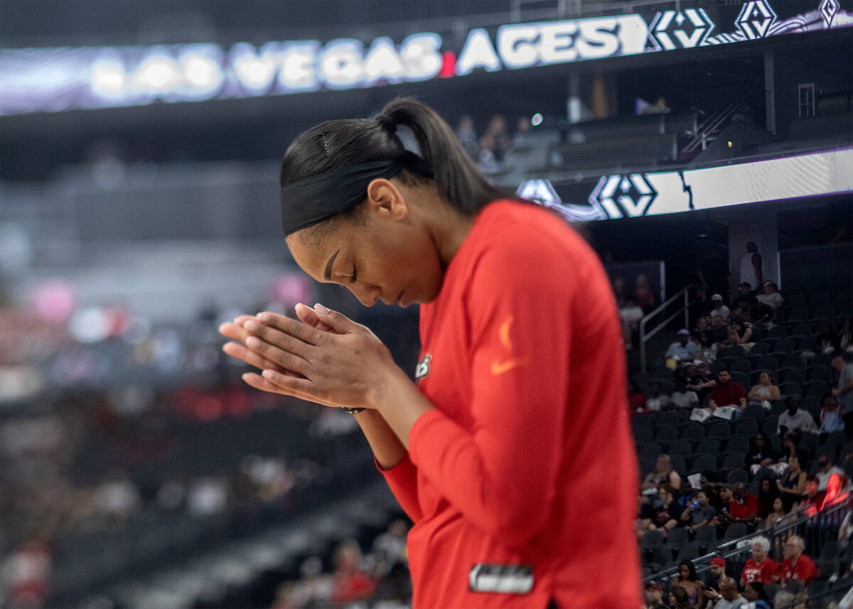 Las Vegas Aces forward A'ja Wilson prays before Game 1 of a WNBA basketball playoff series agai ...