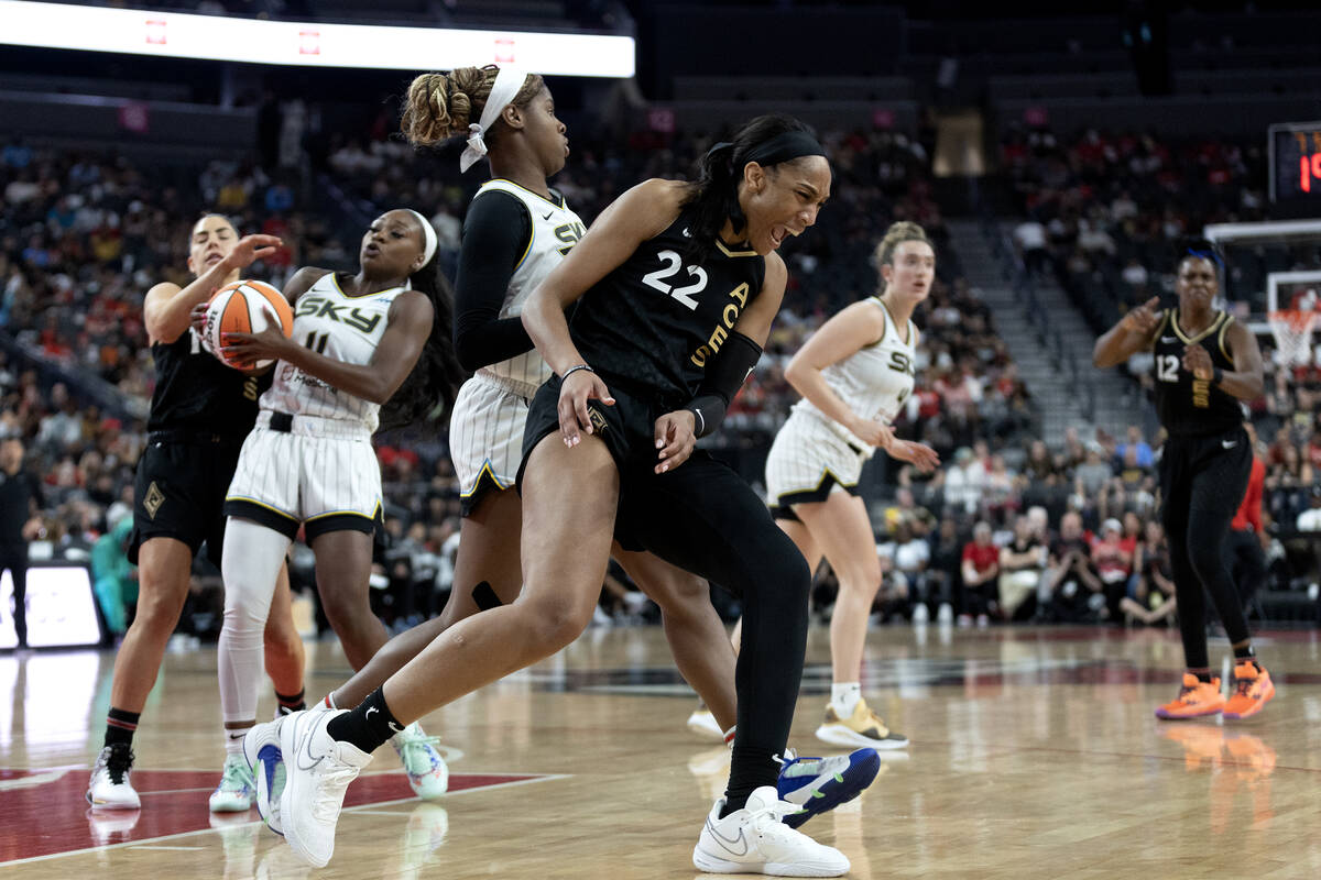 Las Vegas Aces forward A'ja Wilson (22) reacts after being hit in the head on a foul from Chica ...