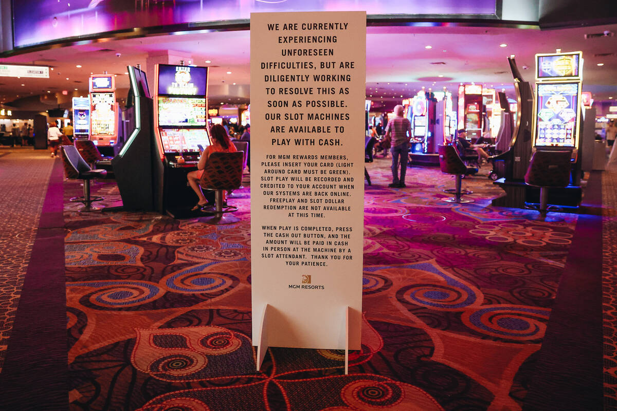 A sign warns guests of difficulties with gambling machines following a hack targeted at MGM Res ...