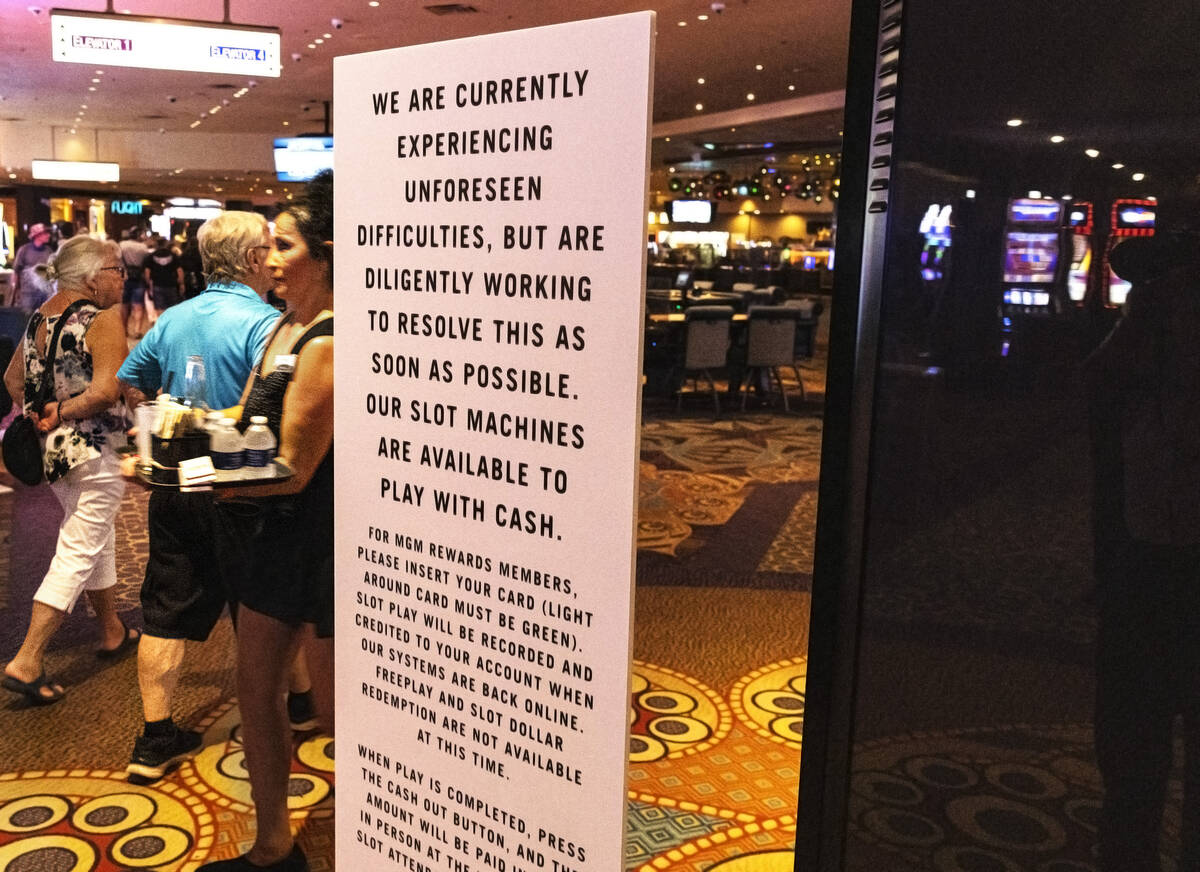 A sign warns guests of difficulties with gambling machines following a hack targeted at MGM Res ...