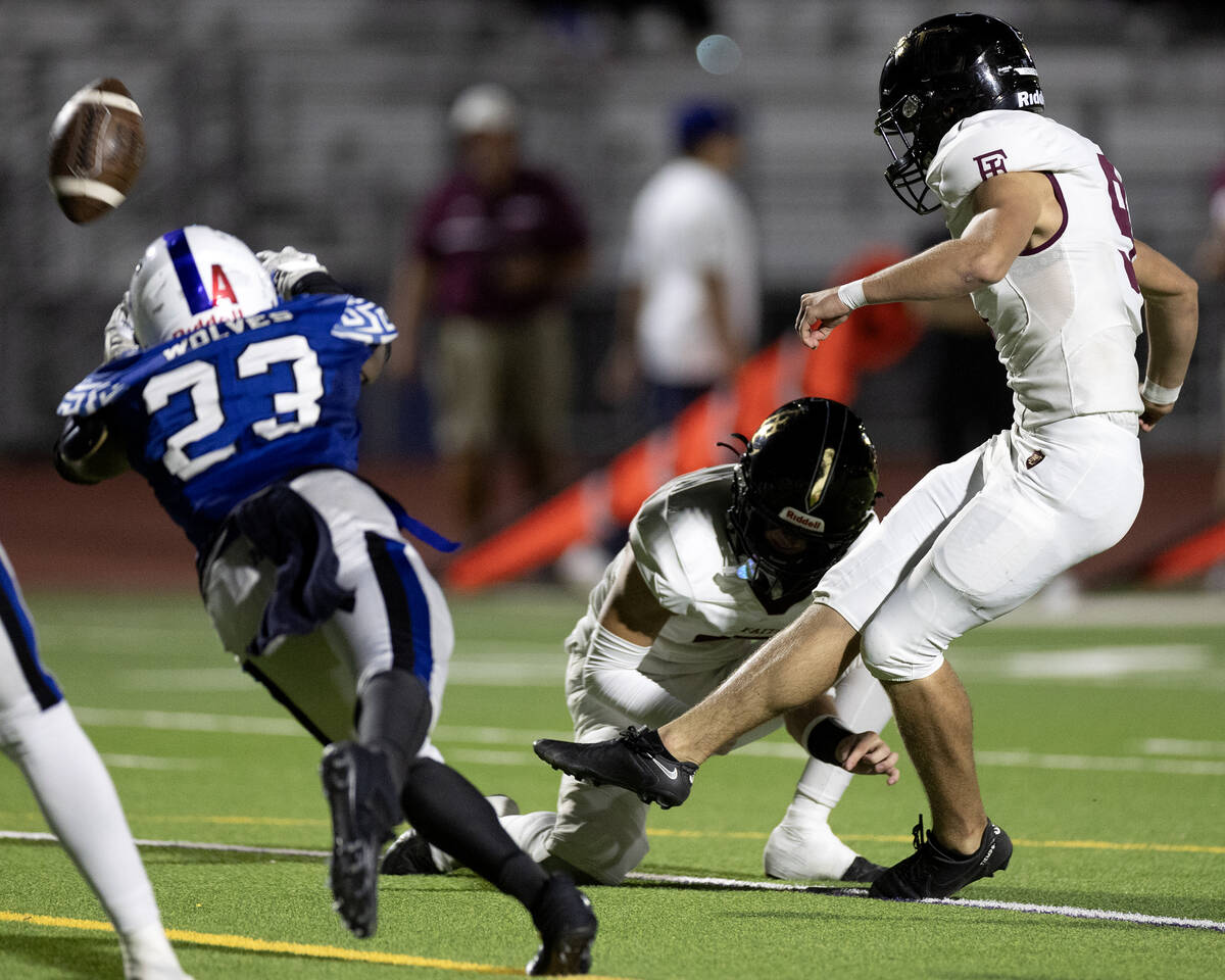 Faith Lutheran kicker Caden Chittenden (9) kicks a field goal during the second half of a high ...