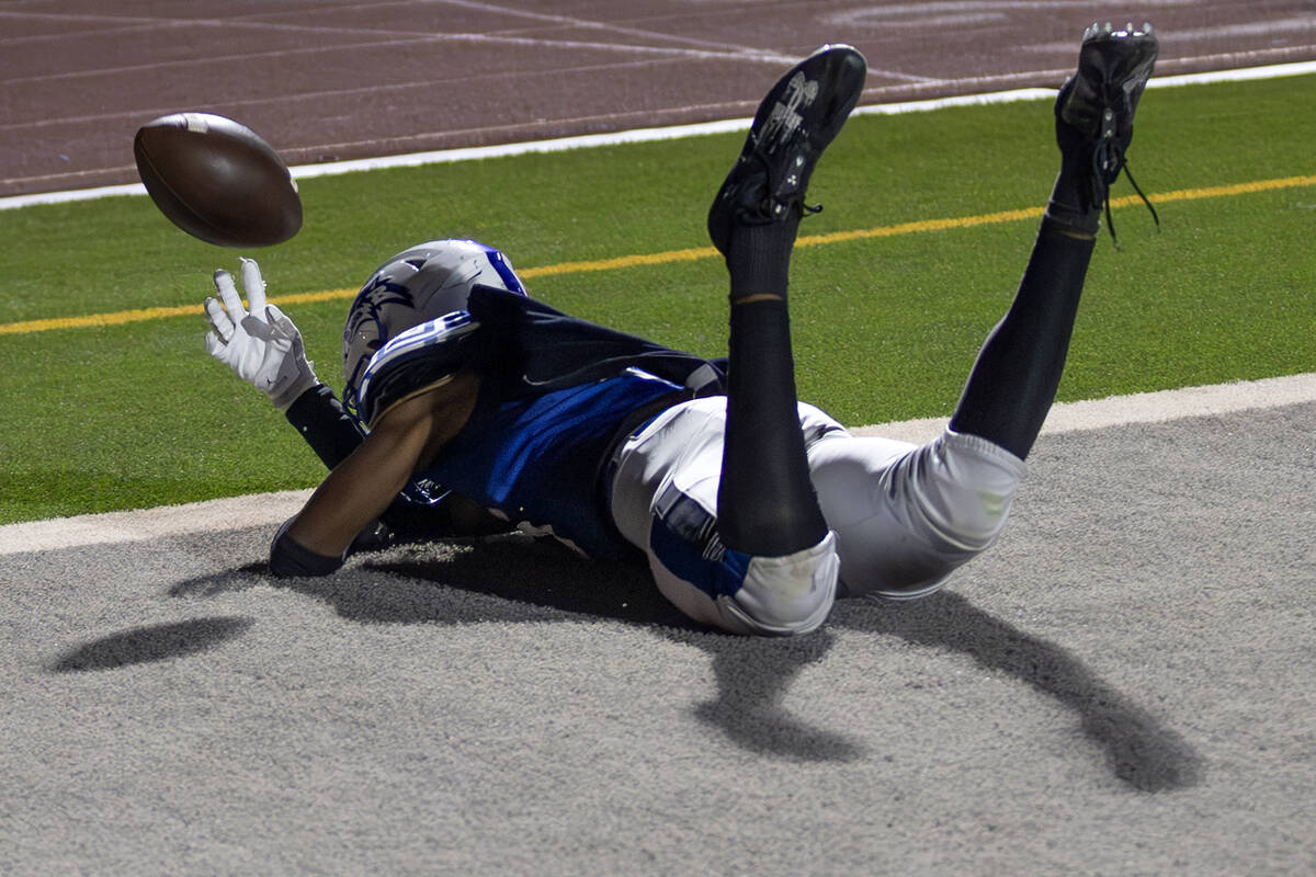 Basic wide receiver Zuri Whiters (23) fumbles a touchdown catch during overtime of a high schoo ...