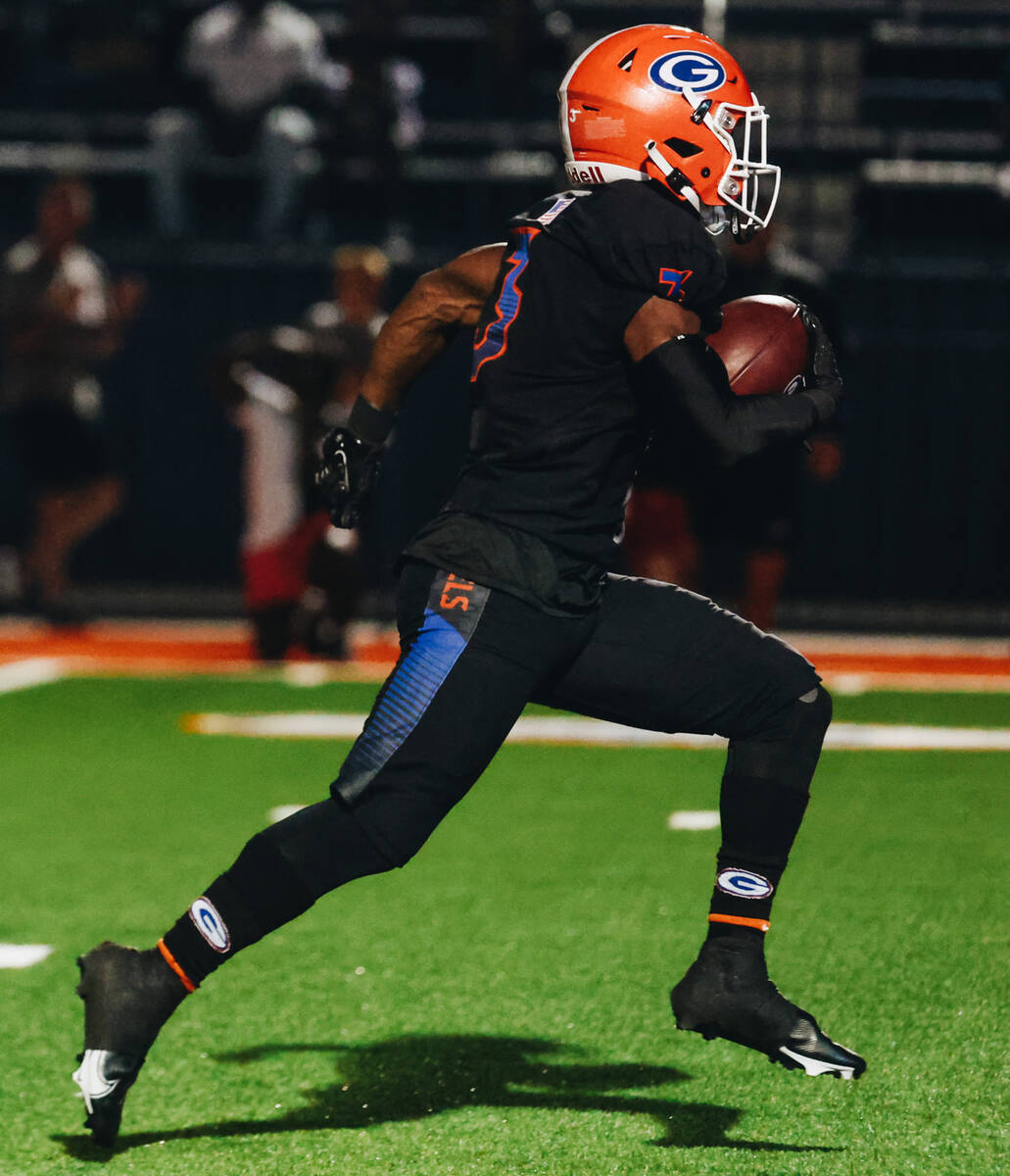 Bishop Gorman running back Devon Rice (3) runs the ball during a game against Liberty at Bishop ...