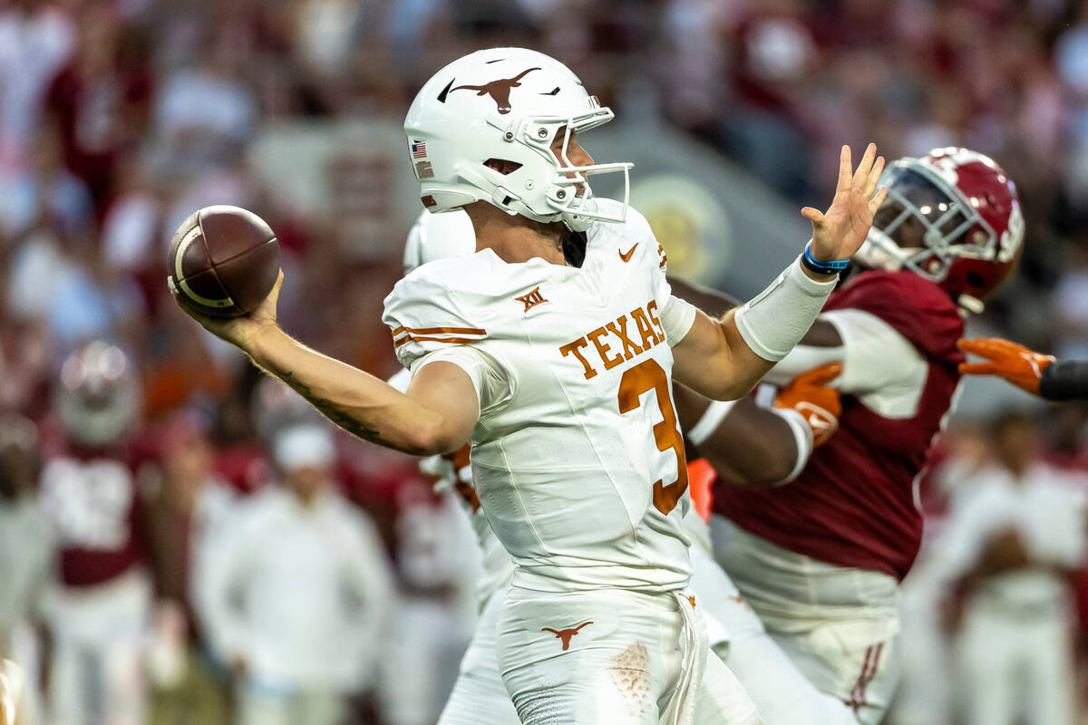 Texas quarterback Quinn Ewers (3) passes against Alabama during the first half of an NCAA colle ...