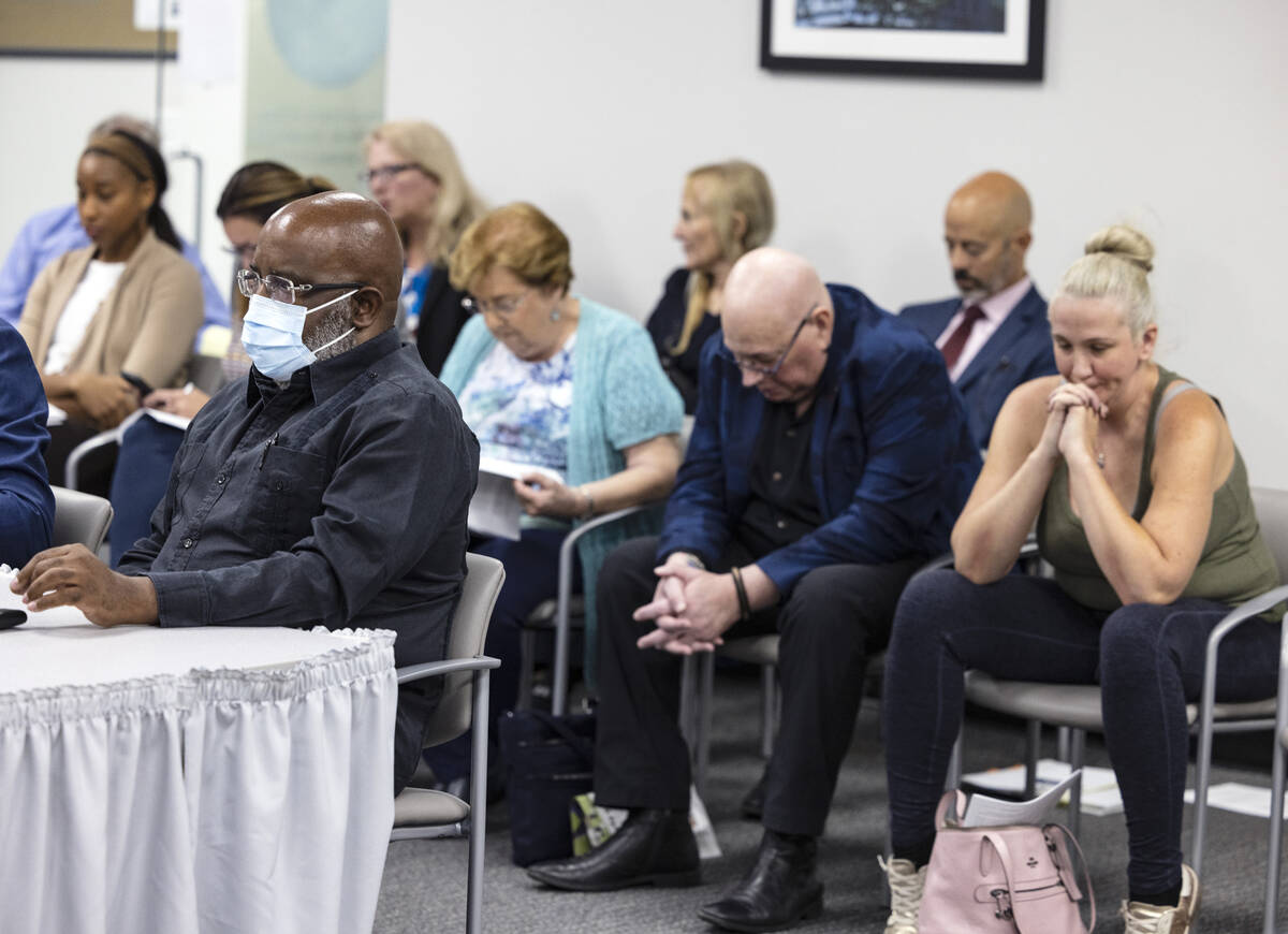 Nicolette Matthews, right, reacts as George Chambers, left, a Las Vegas obstetrician-gynecologi ...