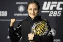 UFC flyweight champion Alexa Grasso poses with her title belt at the UFC 285 post-fight news co ...