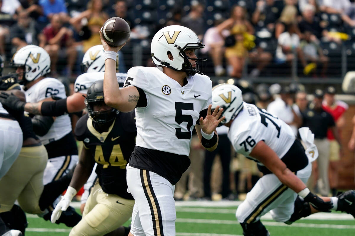 Vanderbilt quarterback AJ Swann (5) looks to pass against Wake Forest during the first half of ...