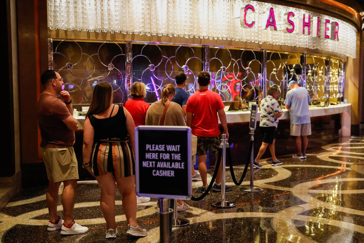 A long line forms at The Cosmopolitan of Las Vegas’ cashier booth on Saturday, Sept. 16, 2023 ...