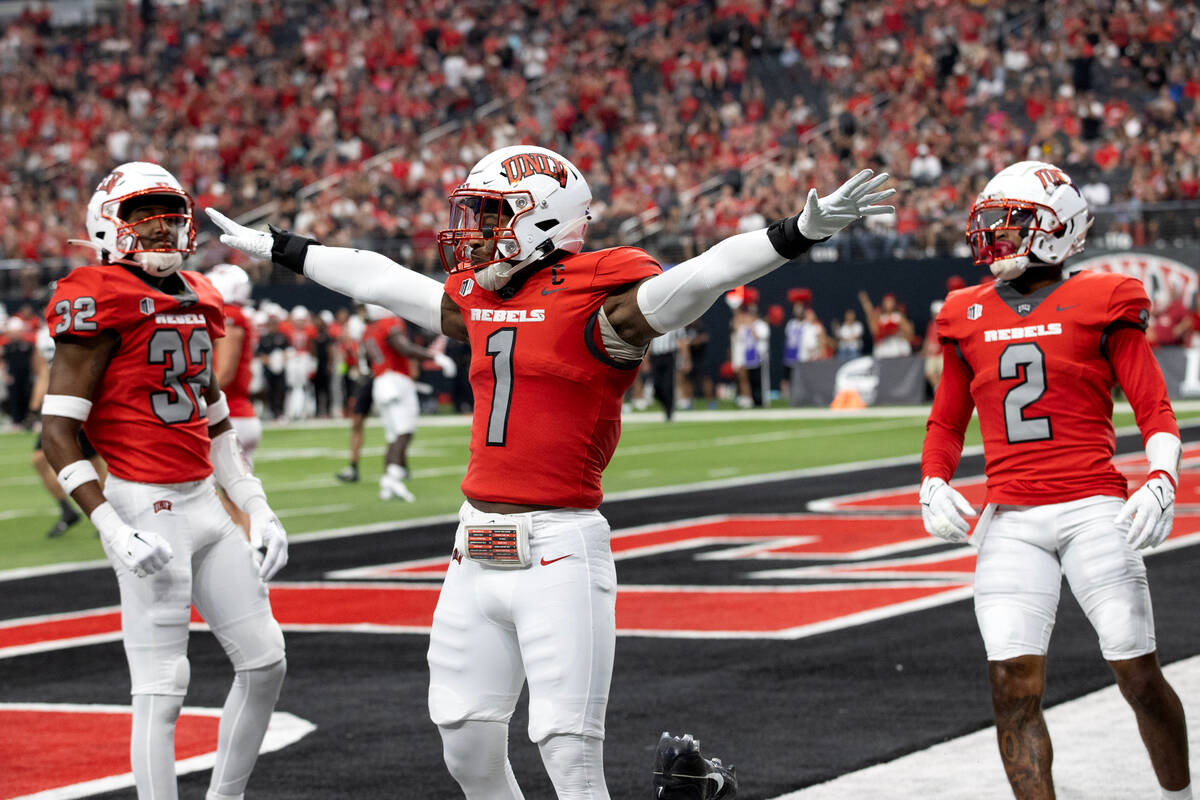 UNLV defensive back Jerrae Williams (1) celebrate after stopping a Vanderbilt touchdown during ...