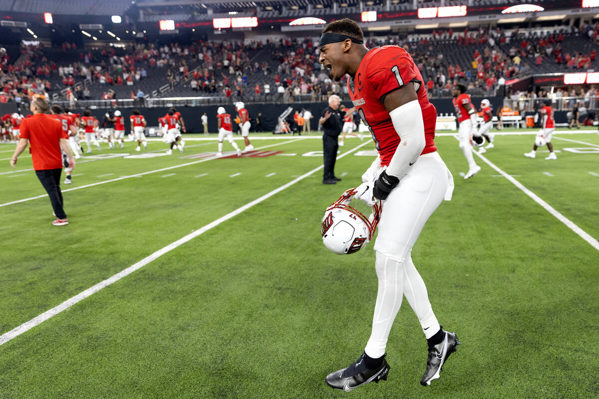 UNLV defensive back Jerrae Williams (1) celebrates his team’s win in an NCAA college foo ...