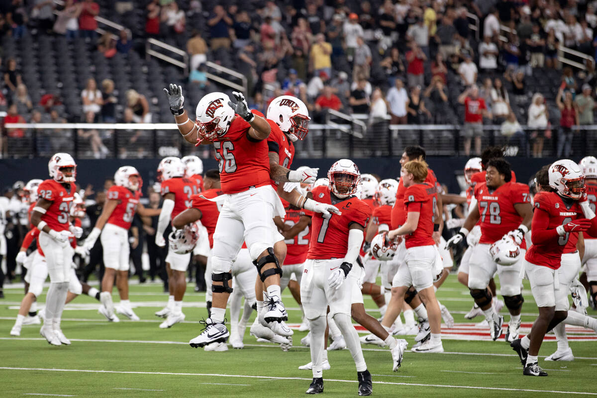 UNLV celebrates their win in a NCAA college football game against Vanderbilt at Allegiant Stadi ...
