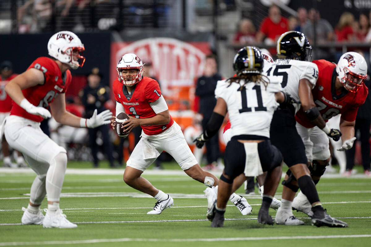 UNLV quarterback Jayden Maiava (1) looks to pass during the second half of an NCAA college foot ...