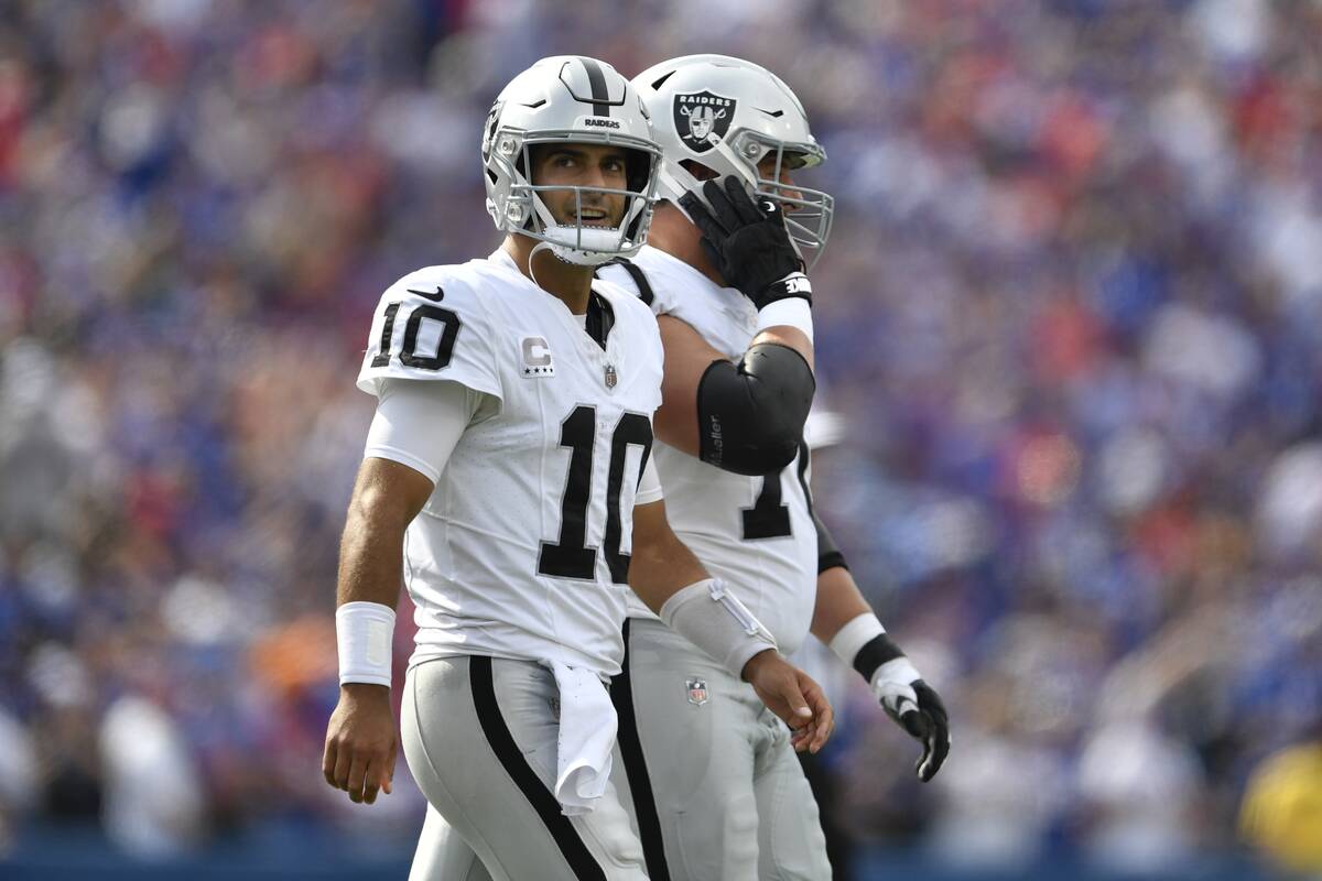 Las Vegas Raiders quarterback Jimmy Garoppolo (10) reacts after throwing an interception during ...
