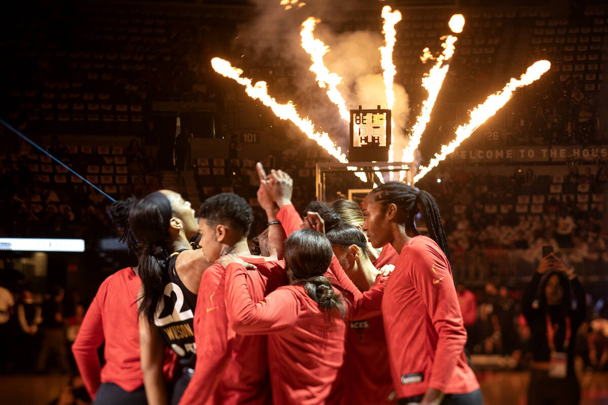 The Las Vegas Aces gather after their starting lineup is announced before Game 2 in a first-rou ...