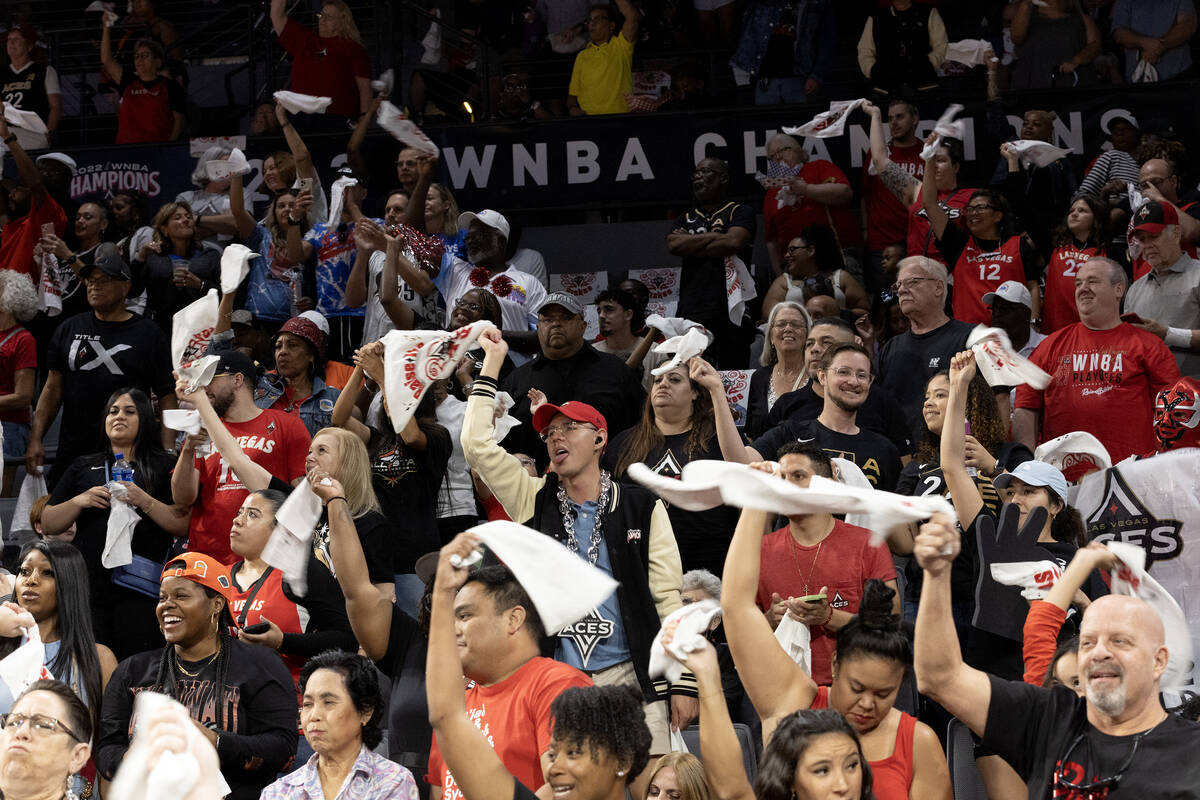Las Vegas Aces fans wave their playoff towels during the second half of Game 2 in a first-round ...