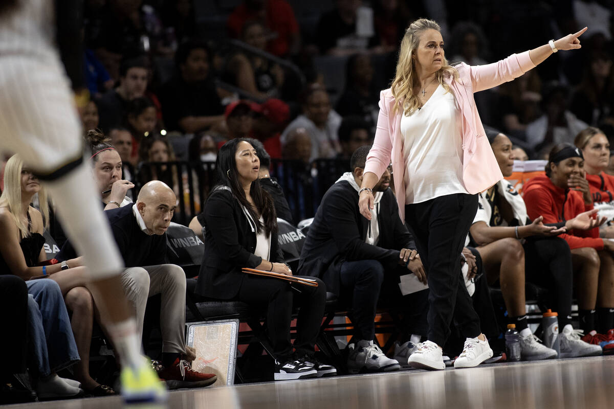 Las Vegas Aces head coach Becky Hammon directs her team from the sidelines during the second ha ...