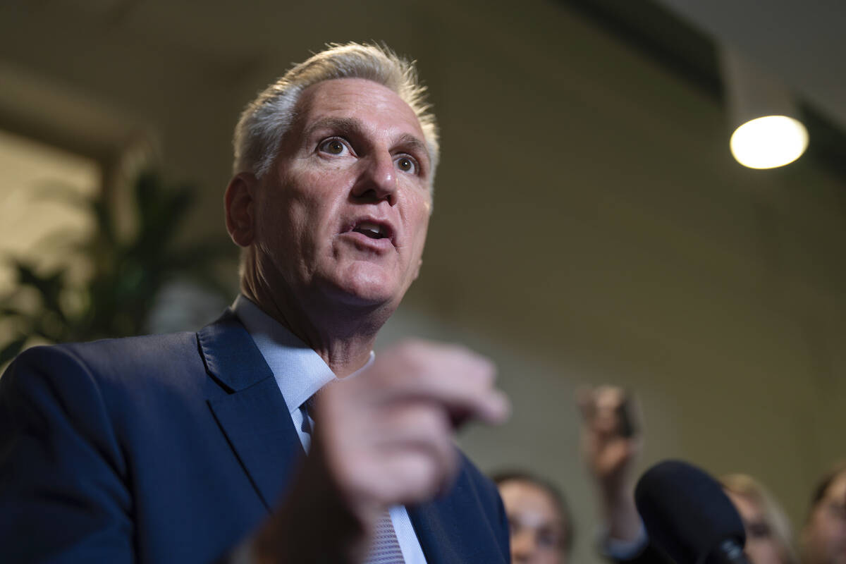 Speaker of the House Kevin McCarthy, R-Calif., briefs reporters following a closed-door Republi ...