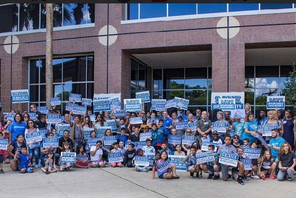 Parents and students rally to save Opportunity Scholarships at a rally outside the Grant Sawyer ...