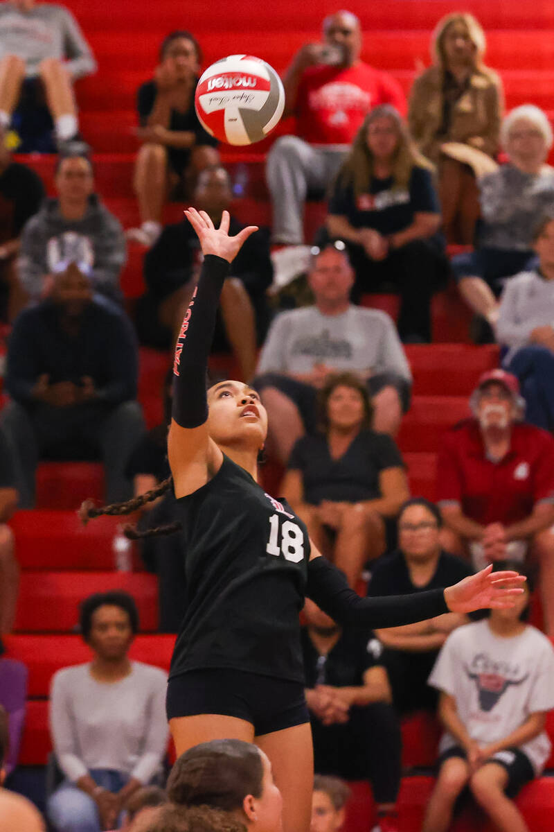 Liberty’s Tehani Moniz (18) sets the ball during a volleyball game between Arbor View Hi ...