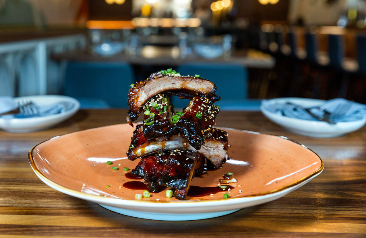 Ribs Aku Aku style with Hawaiian pineapple are prepared at Main St. Provisions in the run up to ...