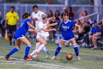 Coronado forward Aubrey Wagner (24) battles for the ball with Bishop Gorman (26) during the fir ...