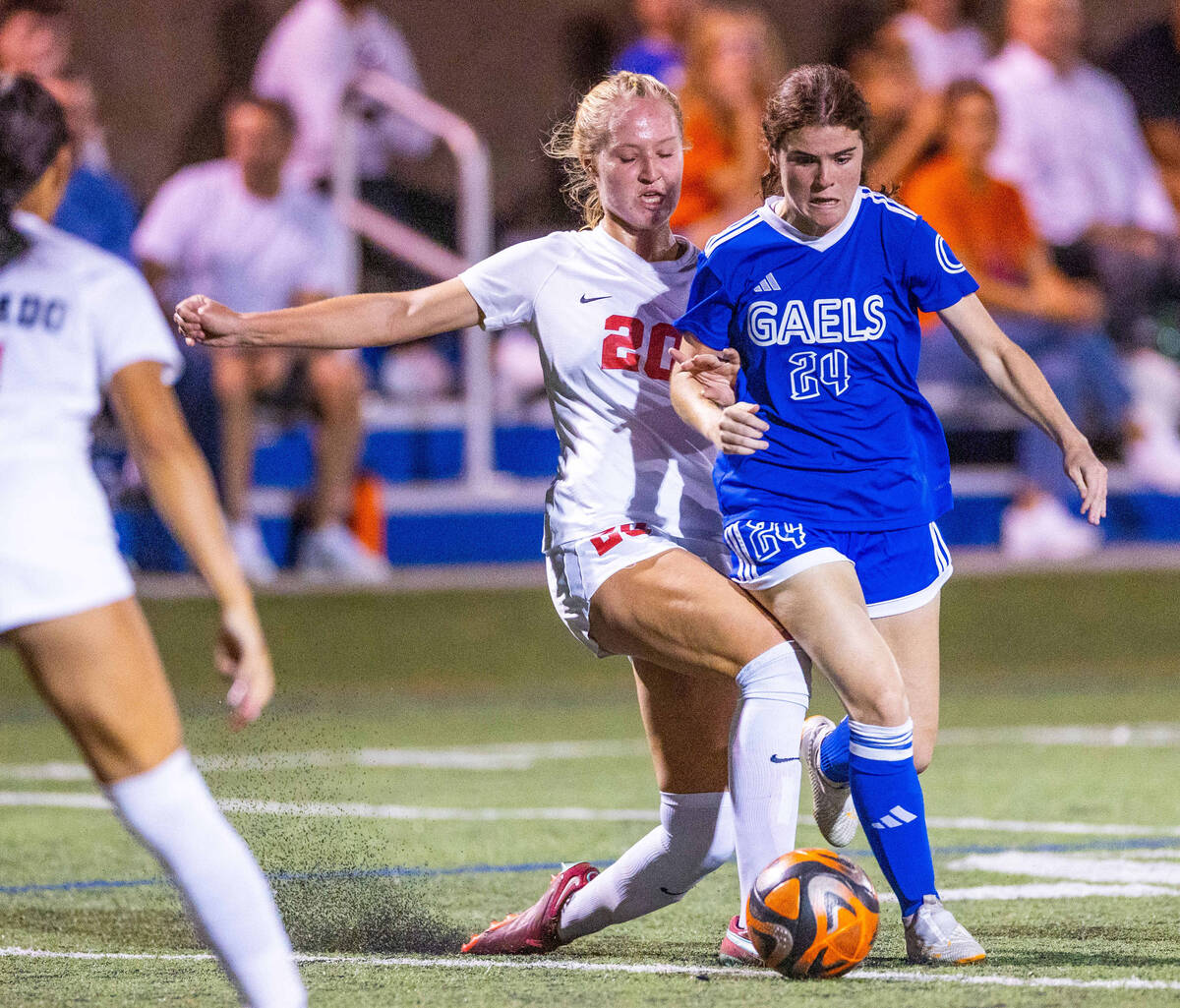 Coronado defender Cate Gusick (20) attempts to take the ball from Bishop Gorman forward Hunter ...