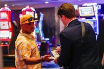 MGM Grand employees pay out guests in cash on Saturday, Sept. 16, 2023, in Las Vegas. MGM Resor ...