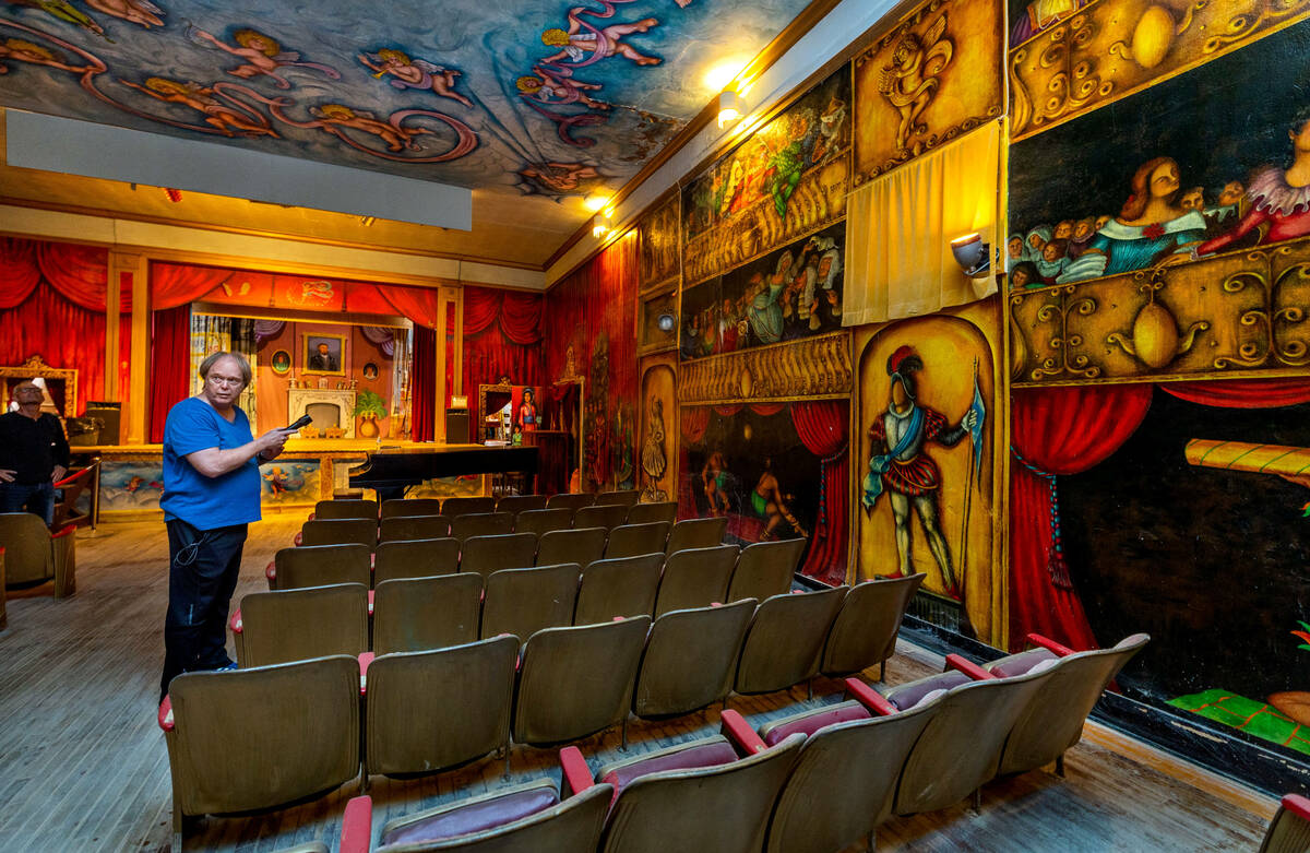 Fred Conboy points out some of the characters painted by former owner and performer Marta Becke ...