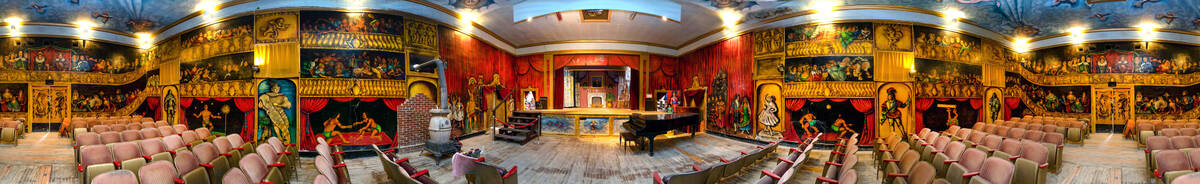 A stitched panorama of the handpainted interior walls and ceiling by former owner and performer ...