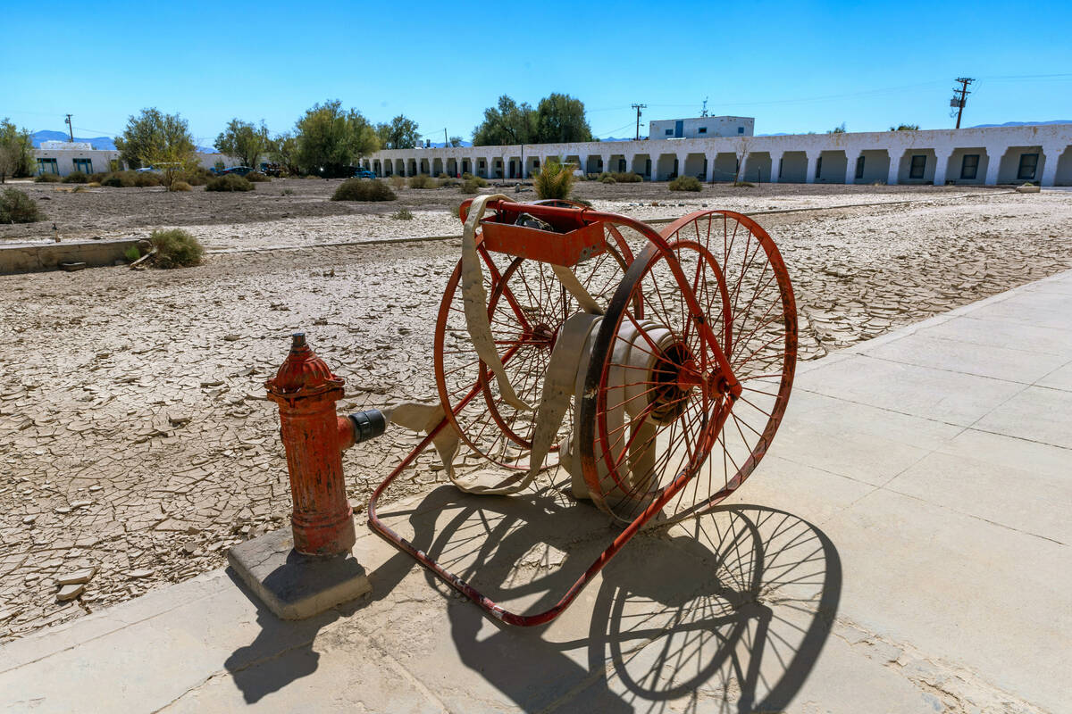 A vintage fire hose caddy outside of the Amargosa Opera House and Hotel about the mud-lined dri ...