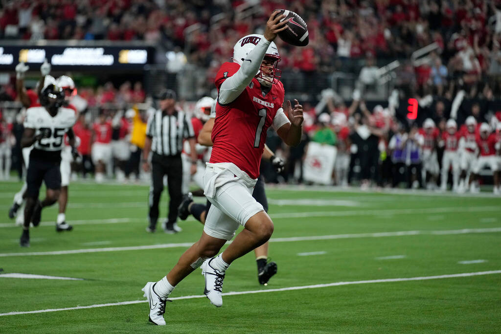 UNLV quarterback Jayden Maiava (1) celebrates as he runs in for a touchdown against the Vanderb ...