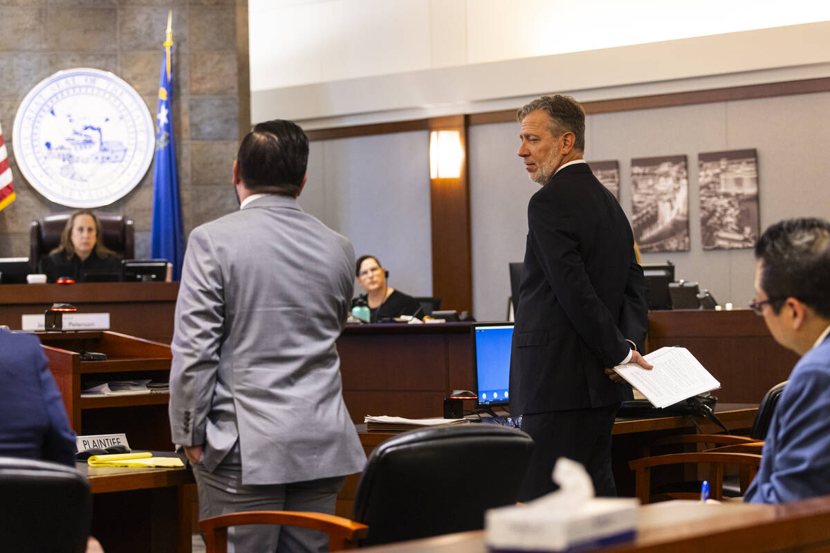 Clark County School District attorney Ethan Thomas, left, and Bradley Schrager, an attorney for ...