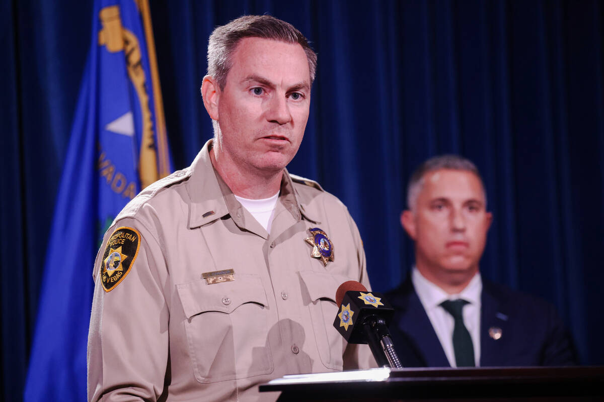 Metro Homicide Lt. Jason Johansson addresses the media at a press conference regarding developm ...