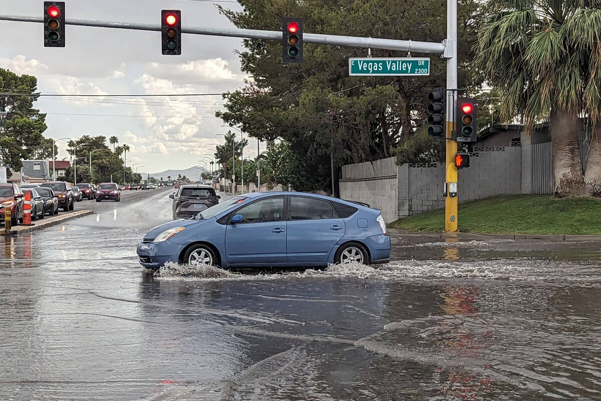 A car drives through the intersection of Eastern Avenue and Vegas Valley Drive in Las Vegas on ...