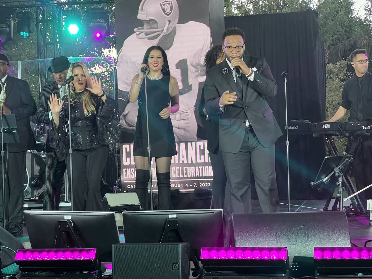 Lily Arce, Rockie Brown and Fletch Walcott are shown the Raiders' party honoring Cliff Branch a ...