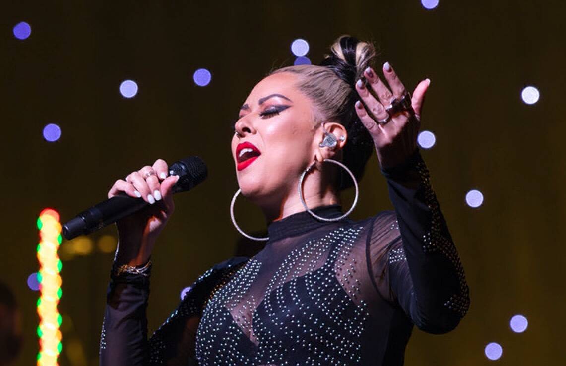 Rockie Brown is shown singing with David Perrico's Pop Symphonic orchestra at Reynolds Hall at ...