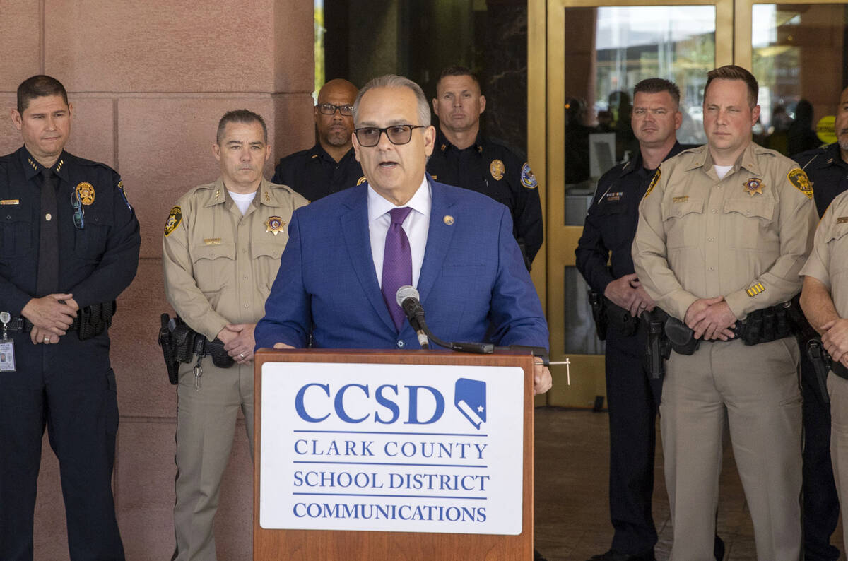 FILE - Clark County School District Superintendent Dr. Jesus Jara speaks from the podium with C ...