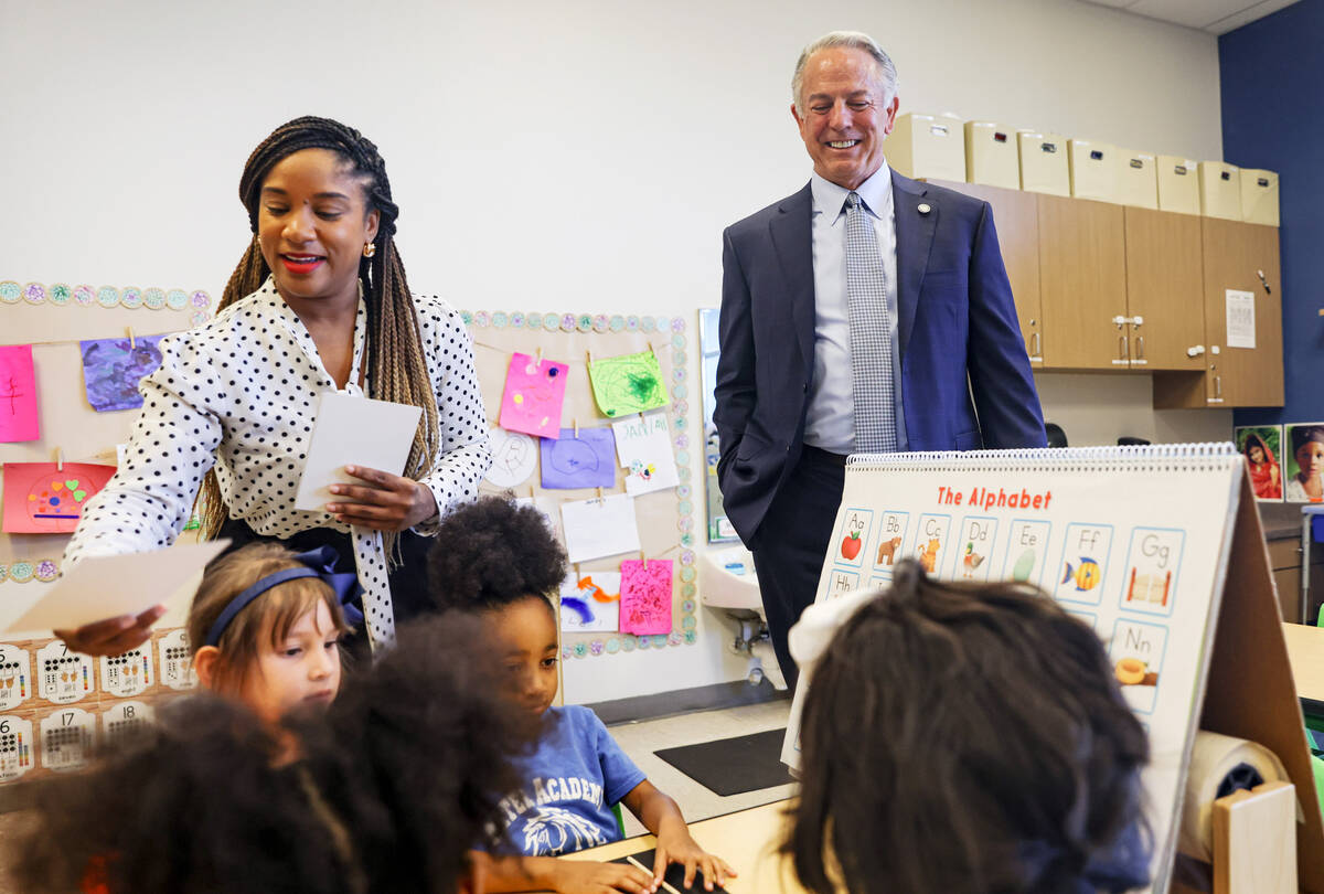 Gov. Joe Lombardo looks on as children participate in a pre-K lesson at Mater Academy Mountain ...