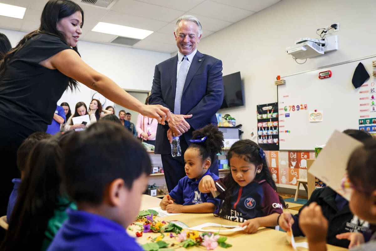 Gov. Joe Lombardo looks on as children participate in a pre-K lesson at Mater Academy Mountain ...