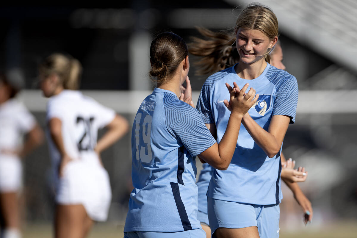 Foothill’s Raquel Patalon (19) and Ava Bertolani, right, celebrate their team’s goal over D ...