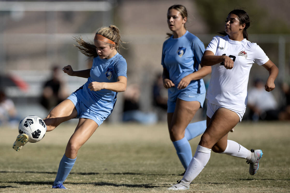 Foothill defender Savanna Truax, left, changes the direction of play while Doral forward Dasha ...