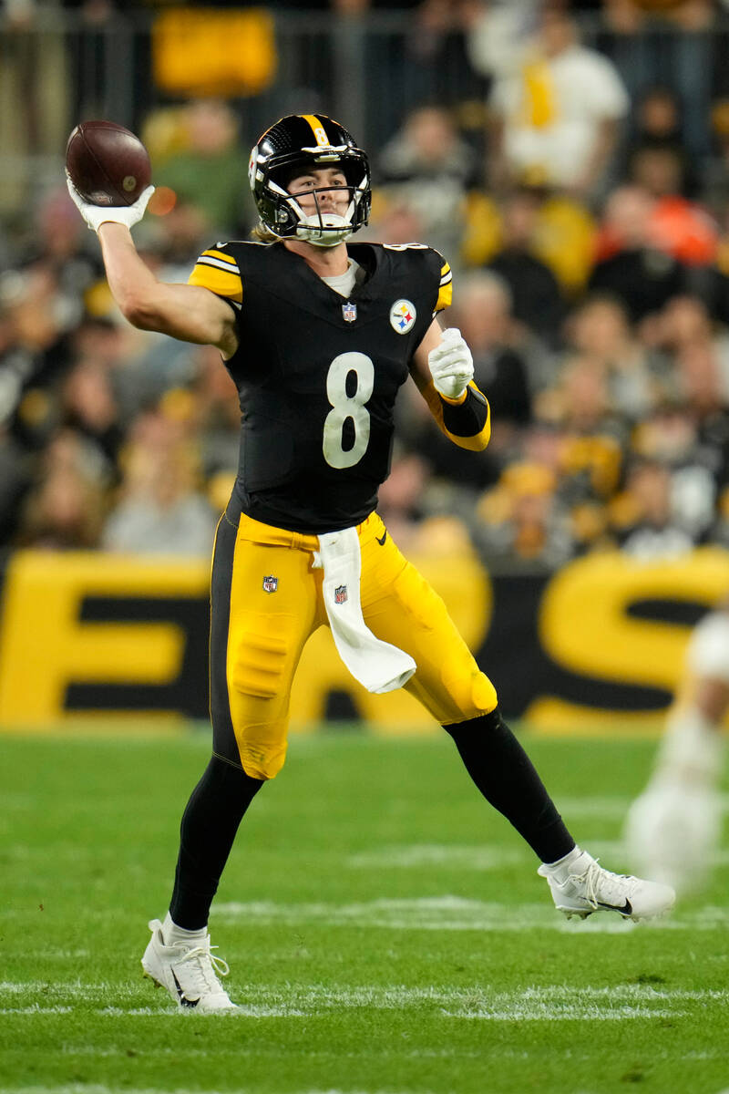 Pittsburgh Steelers quarterback Kenny Pickett (8) throws a pass during an NFL football game aga ...