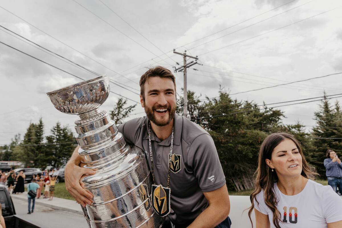 Golden Knights center Nicolas Roy holds the Stanley Cup during a parade in his hometown of Amos ...