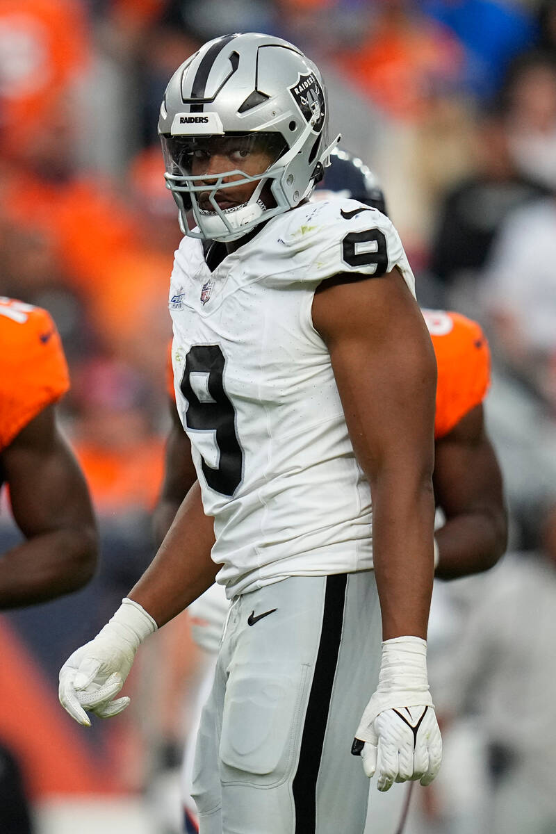 Las Vegas Raiders defensive end Tyree Wilson (9) looks on against the Denver Broncos during an ...