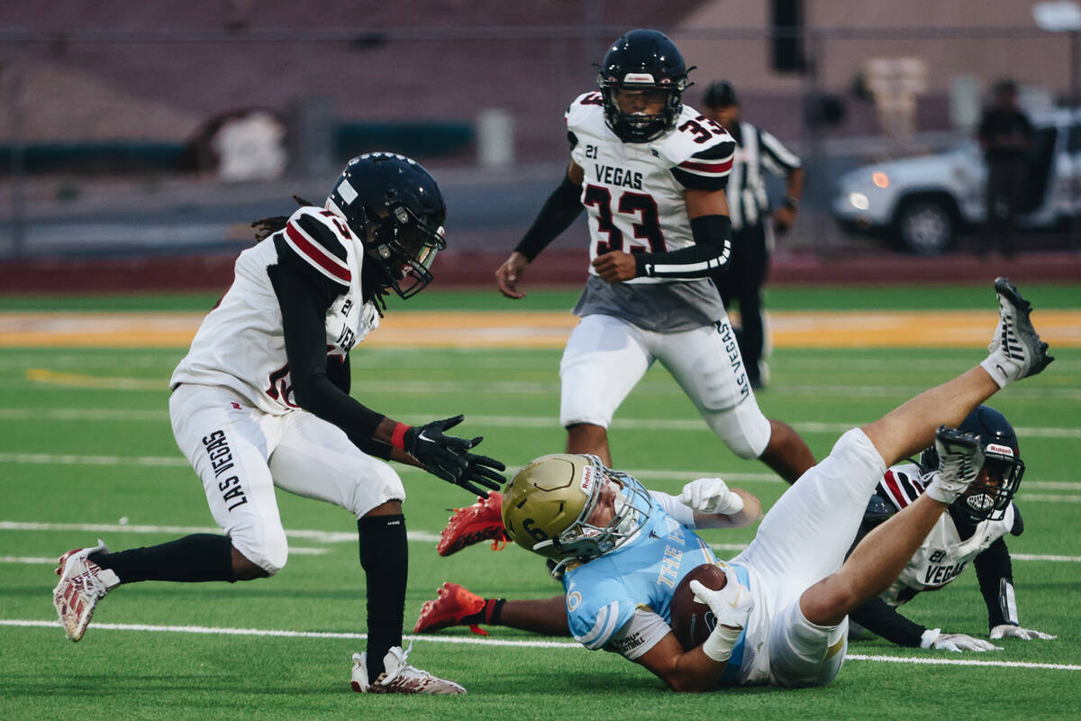 Foothill wide receiver Ethan Stubbs (6) falls with the ball in his hand after a run during a ga ...