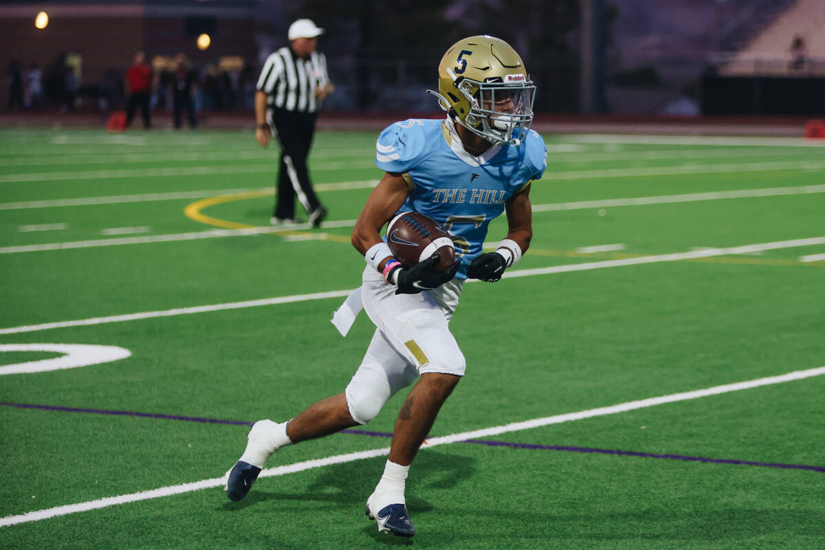 Foothill wide receiver Chase Kennedy runs the ball during a game against Las Vegas at Foothill ...